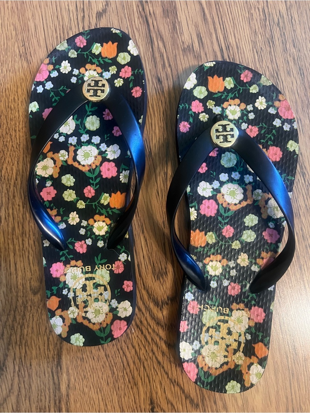 Tory Burch Black Floral Flip Flops Gold Logo chic bohemian designer luxe cos co